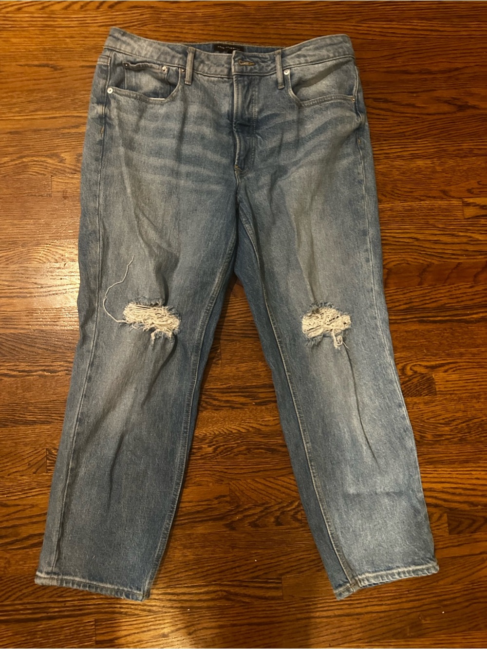 Relaxed Boyfriend Jeans in Faded Blue with Knee Rips